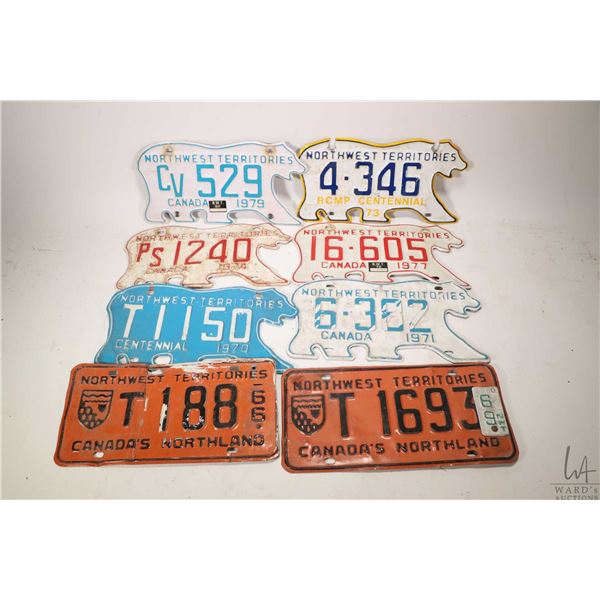 Eight Northwest Territories vintage licence plates including 1966, 1969, 1970, 1971, 1974, 1977, 197