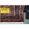 Image 2 : 100% handmade Iranian wool area carpet with brick coloured background, overall geometric design and 