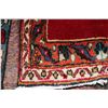 Image 2 : 100% handmade Iranian Mashad scatter rug with floral bouquet medallion and bright red background wit