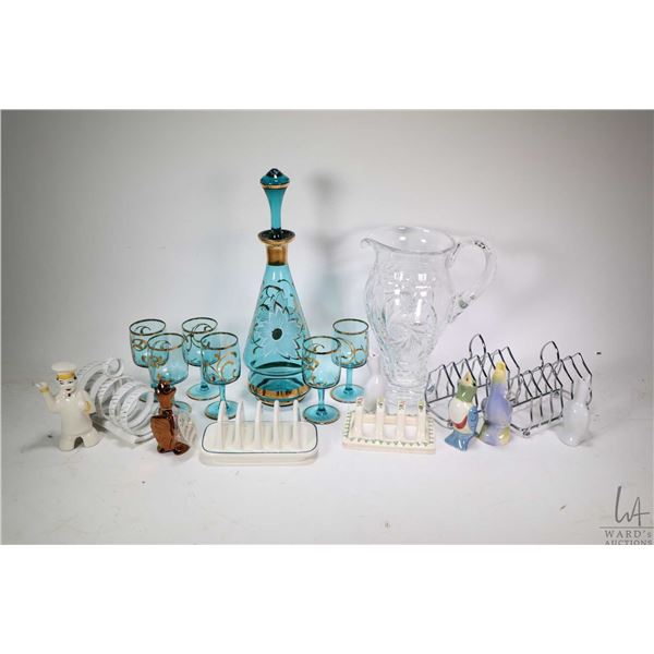 Selection of vintage glass and porcelain collectibles including gold overlay drinks decanter with si