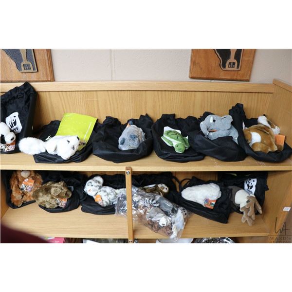 Twelve World Wildlife Fund plush collectibles including Panda, Tiger, Turtle, Arctic Fox, Elephant,
