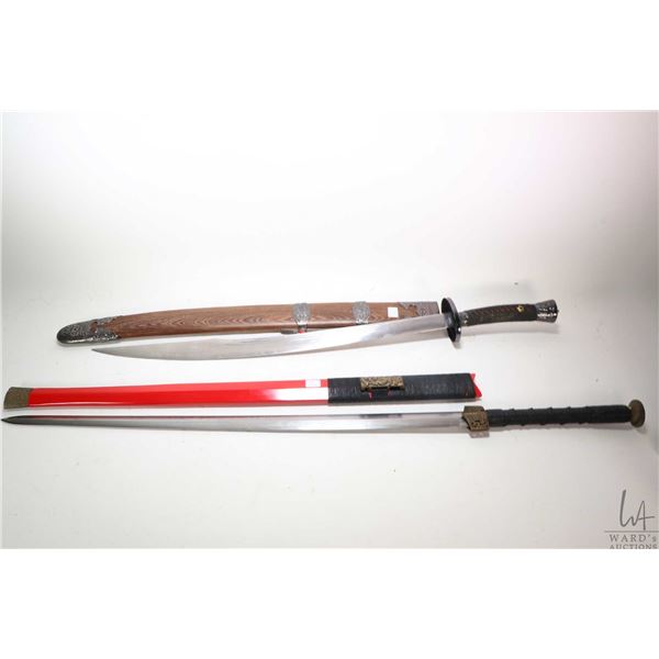 Two swords including a double edge Chinese Jian sword with scabbards and a Simitar with scabbard