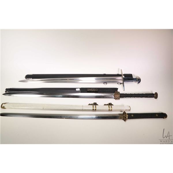 Three replica swords including broadsword, Chinese Jian double edge sword with black scabbard, note 