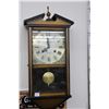 Image 1 : Luxus 31 day wall mount chiming clock, working at time of cataloguing