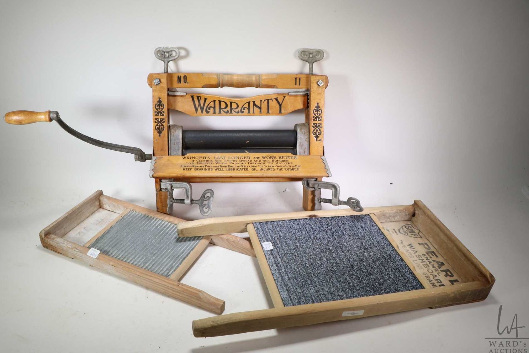 Washboard Ringer Two wood and metal washboard and a Warranty No. 11 wringer plus a Cop-R ...