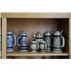 Image 2 : Shelf lot of Avon collectibles including steins, two mugs and a pipe. Note: Not available for shippi