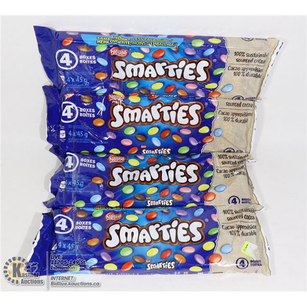 FOUR BAGS WITH 4 BOXES OF SMARTIES CHOCOLATES