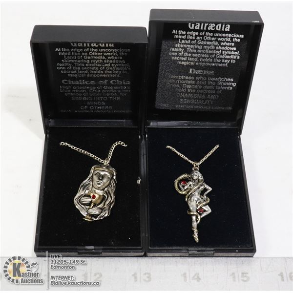 TWO GALRAEDIA PENDANTS ON CHAINS IN CASES