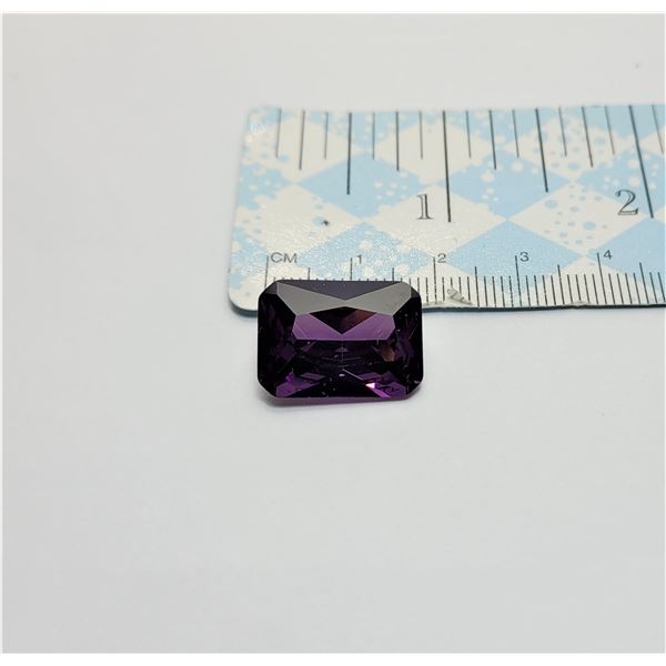 4)  EMERALD CUT 23.7 CT DEEP PURPLE AMETHYST