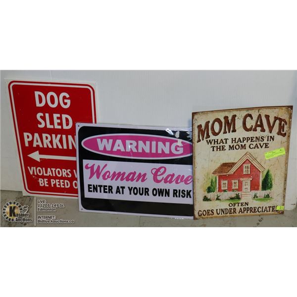 2 METAL SIGNS- DOGSLED PARKING - WOMAN CAVE