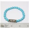 Image 1 : #300-TOURQUOISE BRACELET 735"/ 8mm