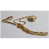 Image 1 : 10 KARAT YELLOW GOLD LOCKET AND CHAIN