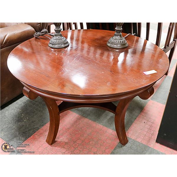 ROUND WOOD TONE COFFEE TABLE 36" X 20"