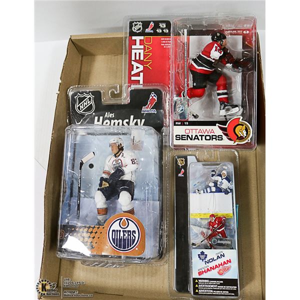 3 SEALED N.H.L. HOCKEY COLLECTIBLE FIGURES