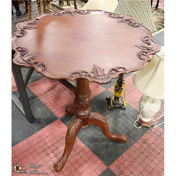 WOOD CARVED BALL IN CLAW END TABLE