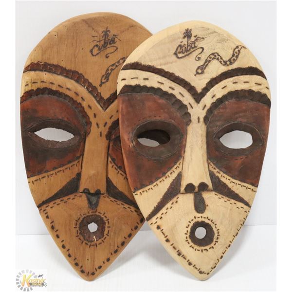 PAIR OF CUBAN WOODEN FACE WALL HANGINGS