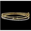 Image 1 : 1.31 ctw Diamond Bangle Bracelet - 14KT Yellow and White Gold