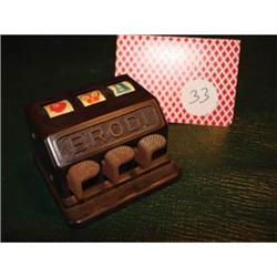 Vintage plastic punch button slot machine