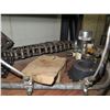 Image 13 : Contents of Shelf: Bread Oven Paddles Pan Alignment, SaniMatic Cleaner, Chains