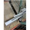 Image 2 : Contents of Shelf: Metal Lengths, Expanding Hose, Curved Pipe, Connectors