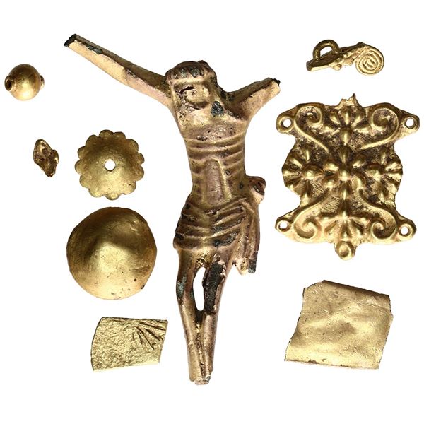 Lot of nine small gold and gilt-copper crucifix pieces, early Spanish colonial, ca. 17th century.