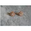 a pair of gold earrings with briljant cut #1601759