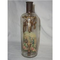 Bottle with crucifix in it #1585417