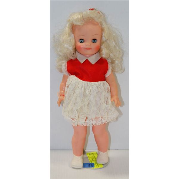 18" GIRL DOLL IN RED DRESS.  #5702