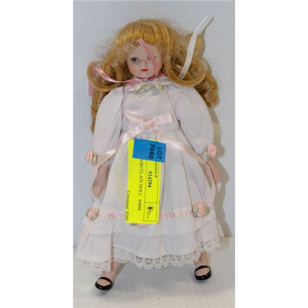 LITTLE PORCELAIN DOLL.  #4808