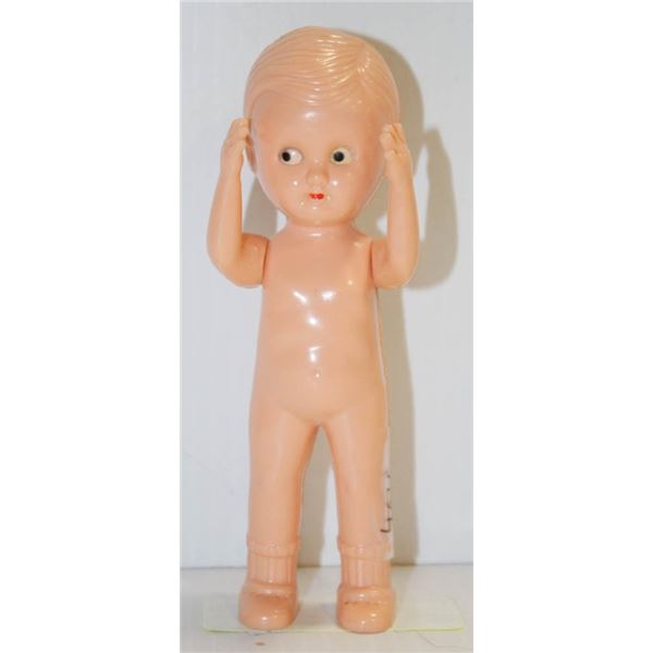 RELIABLE HARD PLASTIC BOY DOLL.  #4616