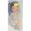 Image 1 : ANTIQUE HINGED BOY DOLL IN BAG.  #5302