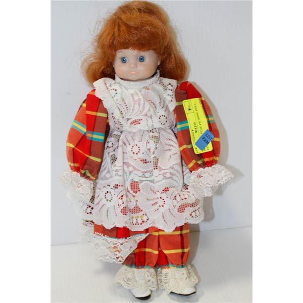 PORCELAIN HEAD FROWING DOLL.  #4207