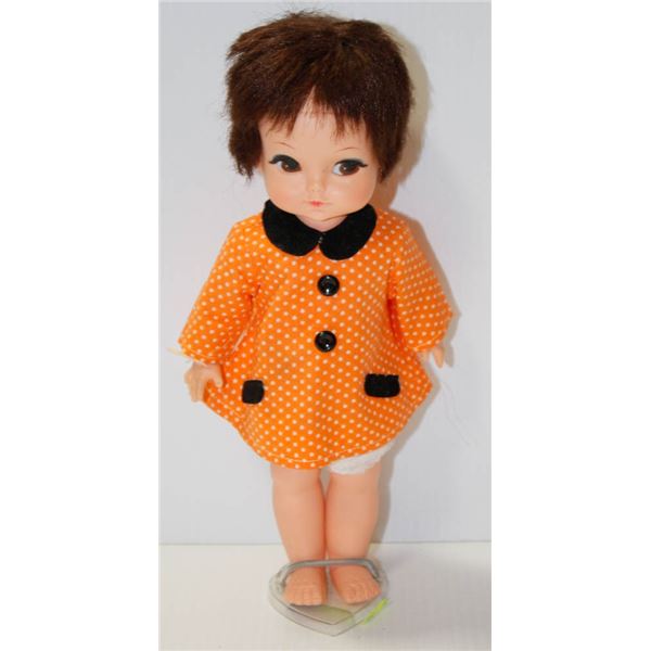 REGAL DOLL IN ORANGE DRESS WITH BROWN EYES.  #4903
