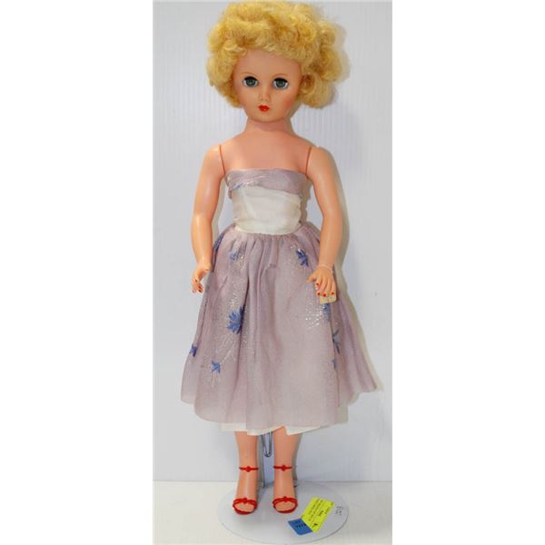 1958 "MISS REVLON" DOLL IN PURPLE DRESS.  #5213
