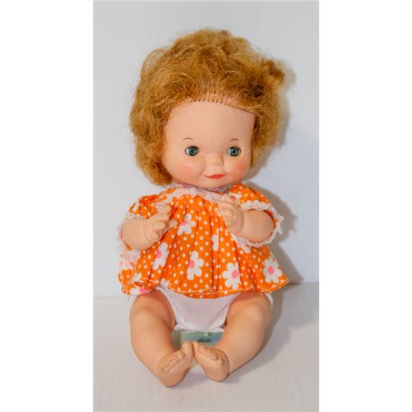 RELIABLE TODDLER DOLL IN ORANGE DRESS.  #5808