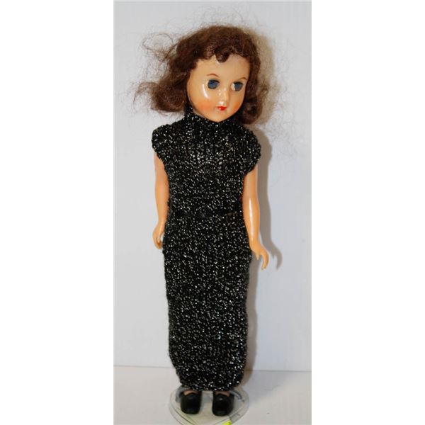 HARD PLASTIC DOLL IN BLUE SPARKLY DRESS.  #4803
