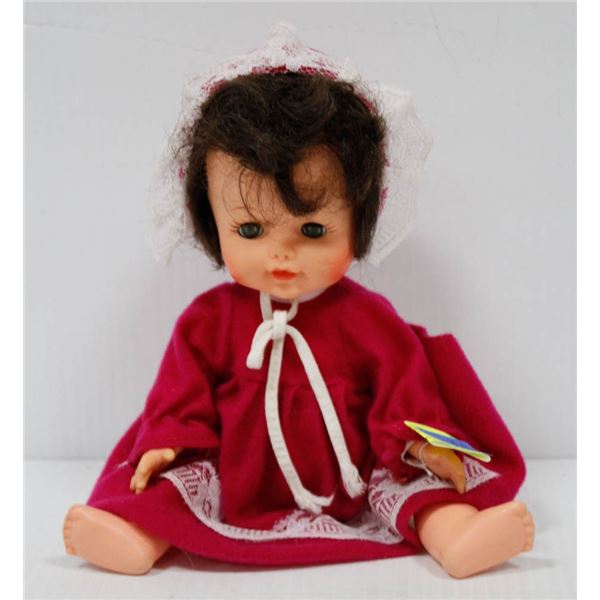 REGAL TODDLER DOLL IN FUCIA DRESS.  #5613