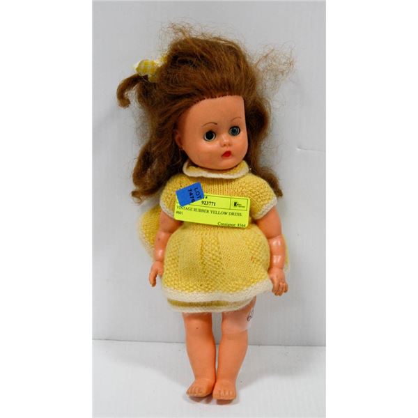 VINTAGE RUBBER DOLL IN YELLOW DRESS.  #601