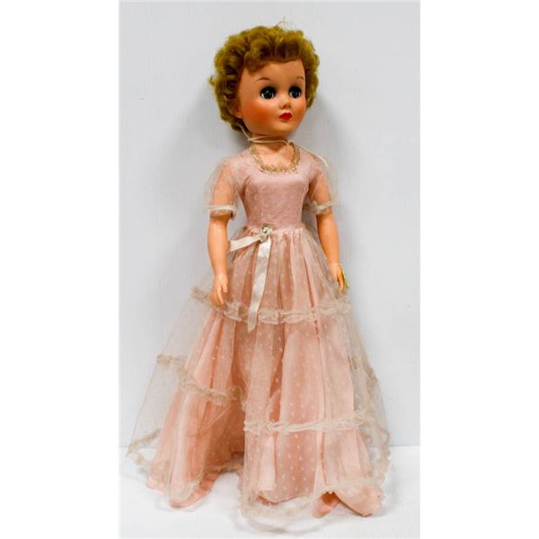 1955 24" DOLL IN PINK DRESS.  #5602