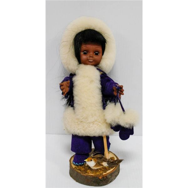 ESKIMO CHILD, PURPLE CLOTHES.  #3804