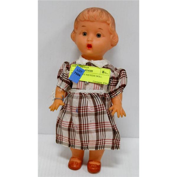 1963 RELIABLE SQUEEZE DOLL.  #3810