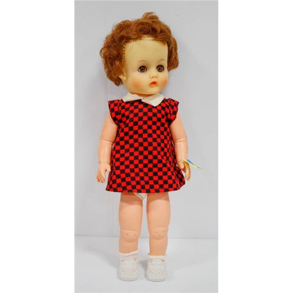 RELIABLE RUBBER DOLL IN CHECKERED DRESS.  #4304