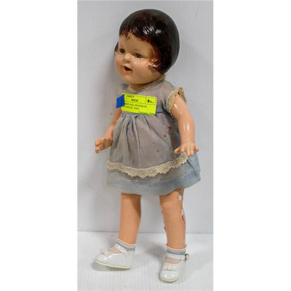 UNMARKED DOLL WITH BLUE DRESS, BAD LEG.  #3412