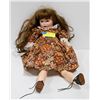 Image 1 : FRENCH SFBJ JOINTED DOLL IN FLORAL DRESS.  #5311