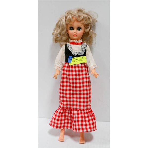 PLASTIC DOLL IN PLAID DRESS.  #4603