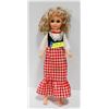 Image 1 : PLASTIC DOLL IN PLAID DRESS.  #4603