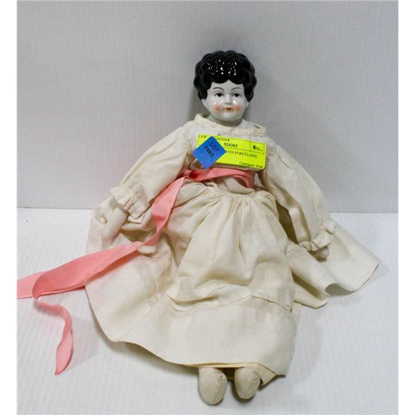 FABRIC DOLL WITH PORCELAINE HEAD.  #5314