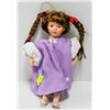 Image 1 : PORCELAINE "PIG TAILS" DOLL IN PURPLE DRESS.  #53