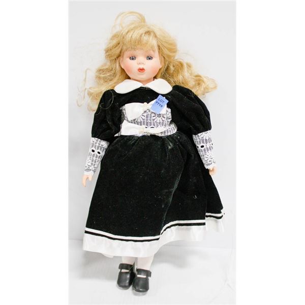 1994 PORCELAIN FACE DOLL W/ STUFFED BODY IN BLACK VELVET DRESS