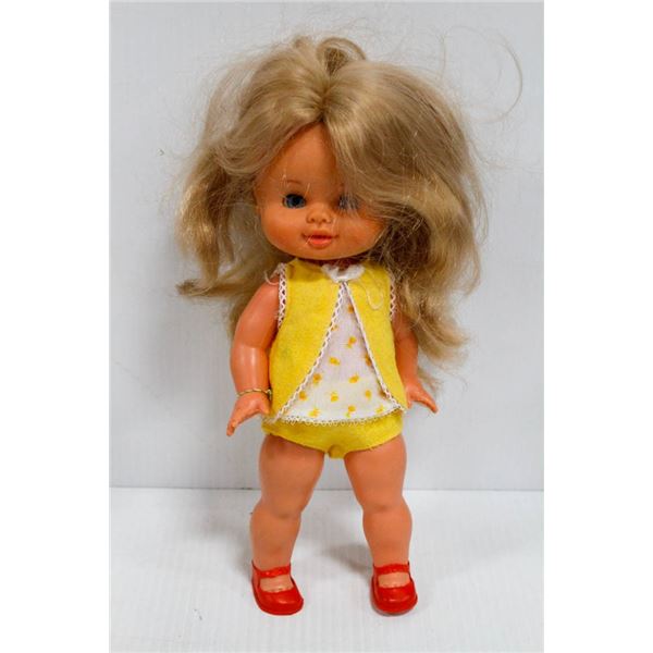 FAMOSA GIRL CHILD DOLL IN YELLOW OUTFIT